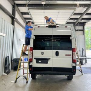 crew working on custom work van
